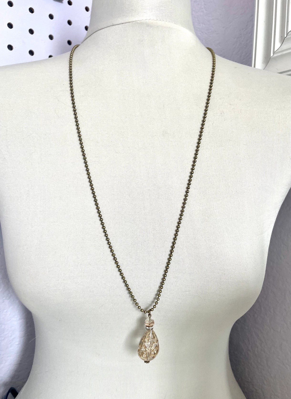 Gold ornate teardrop necklace