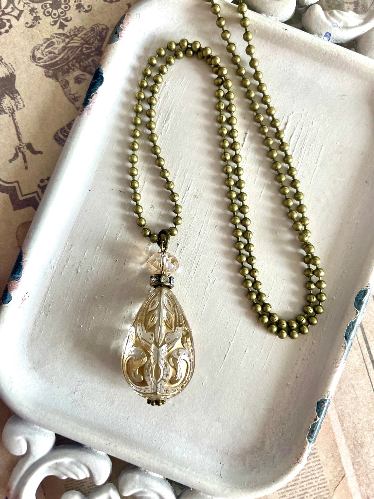 Gold ornate teardrop necklace