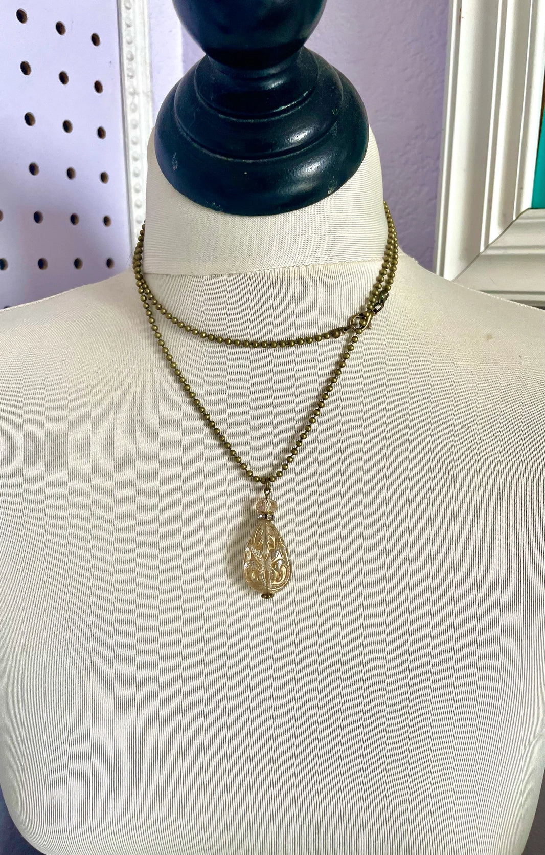 Gold ornate teardrop necklace