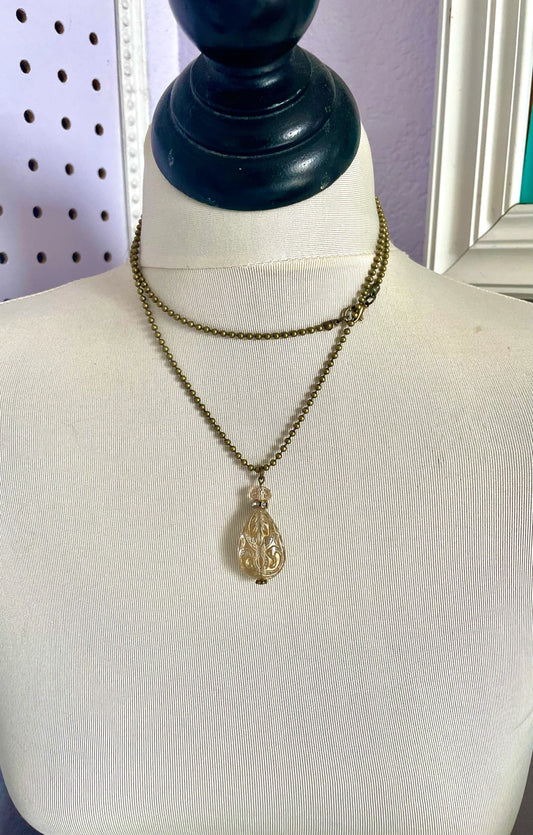 Gold ornate teardrop necklace
