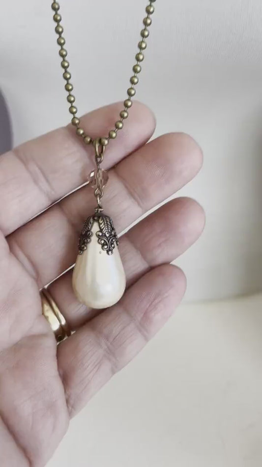 Arlena Pearl - Large teardrop pearl necklace on antique gold necklace