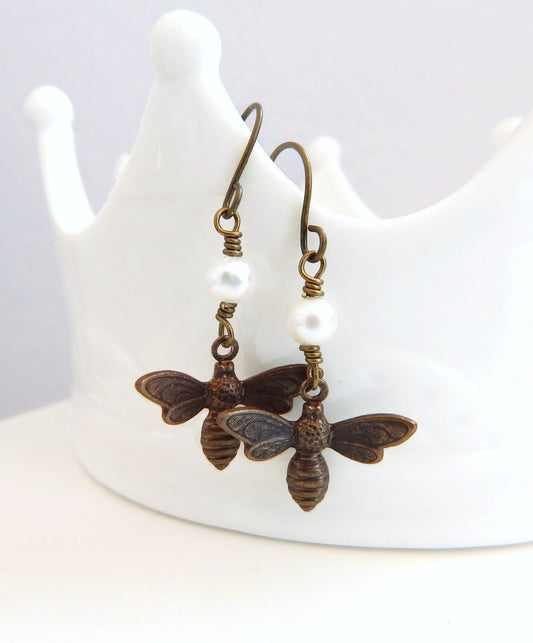 Bee charm earrings with white pearls