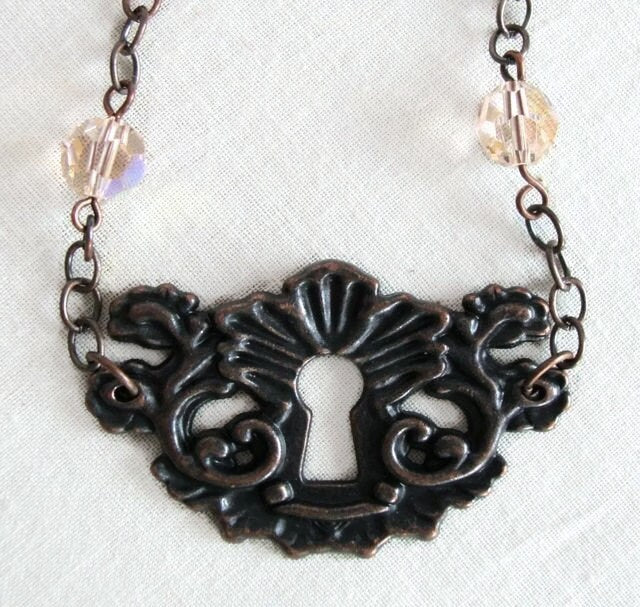 Francisca - antique copper keyhole and charm necklace