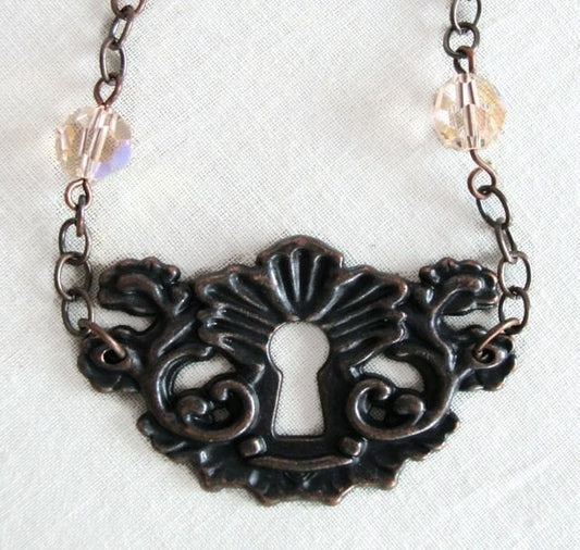 Francisca - antique copper keyhole and charm necklace