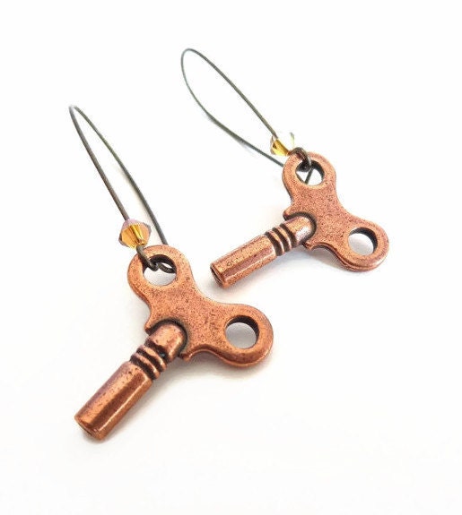 Kay - copper wind up key earrings