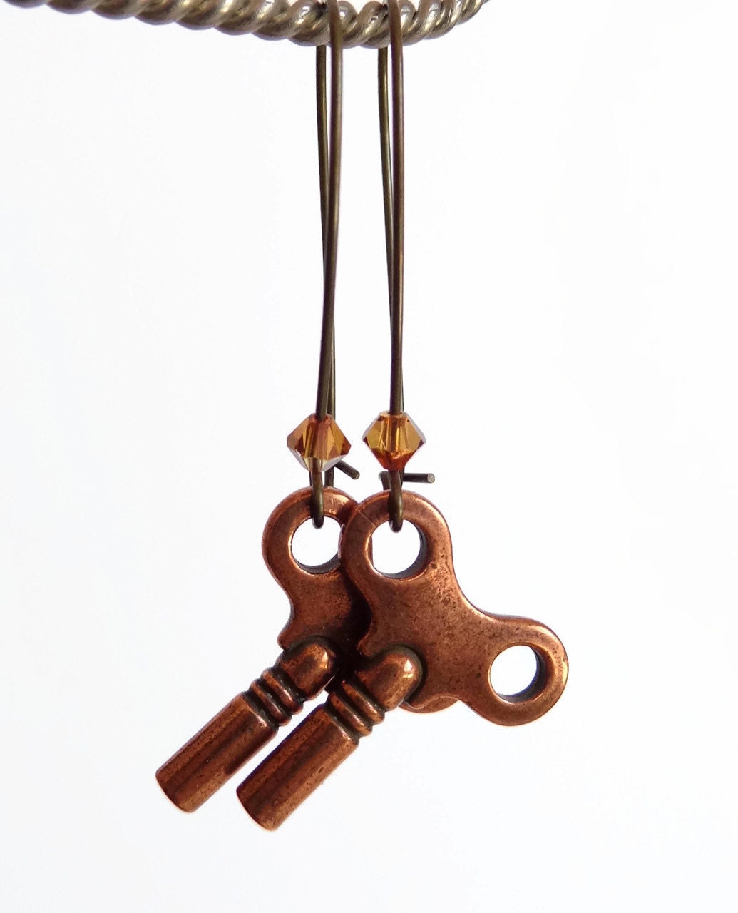 Kay - copper wind up key earrings