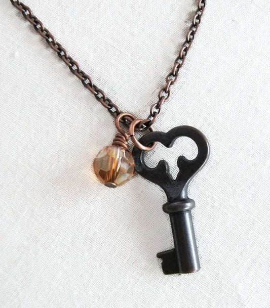 Mona - antique copper key necklace with Swarovski crystal