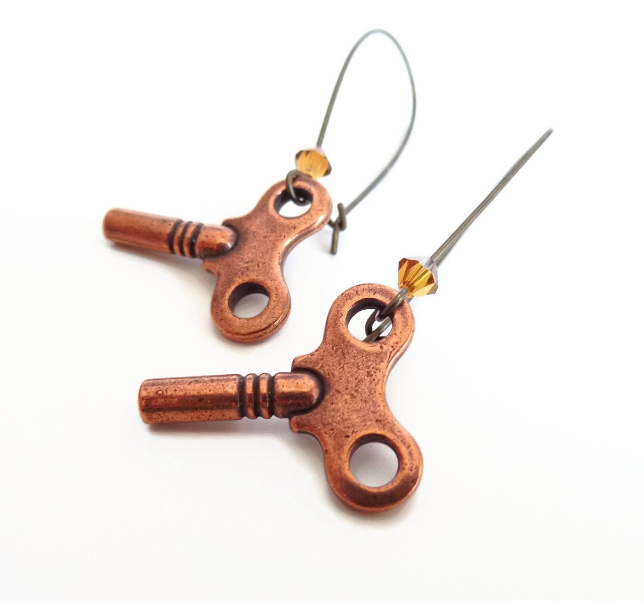 Kay - copper wind up key earrings