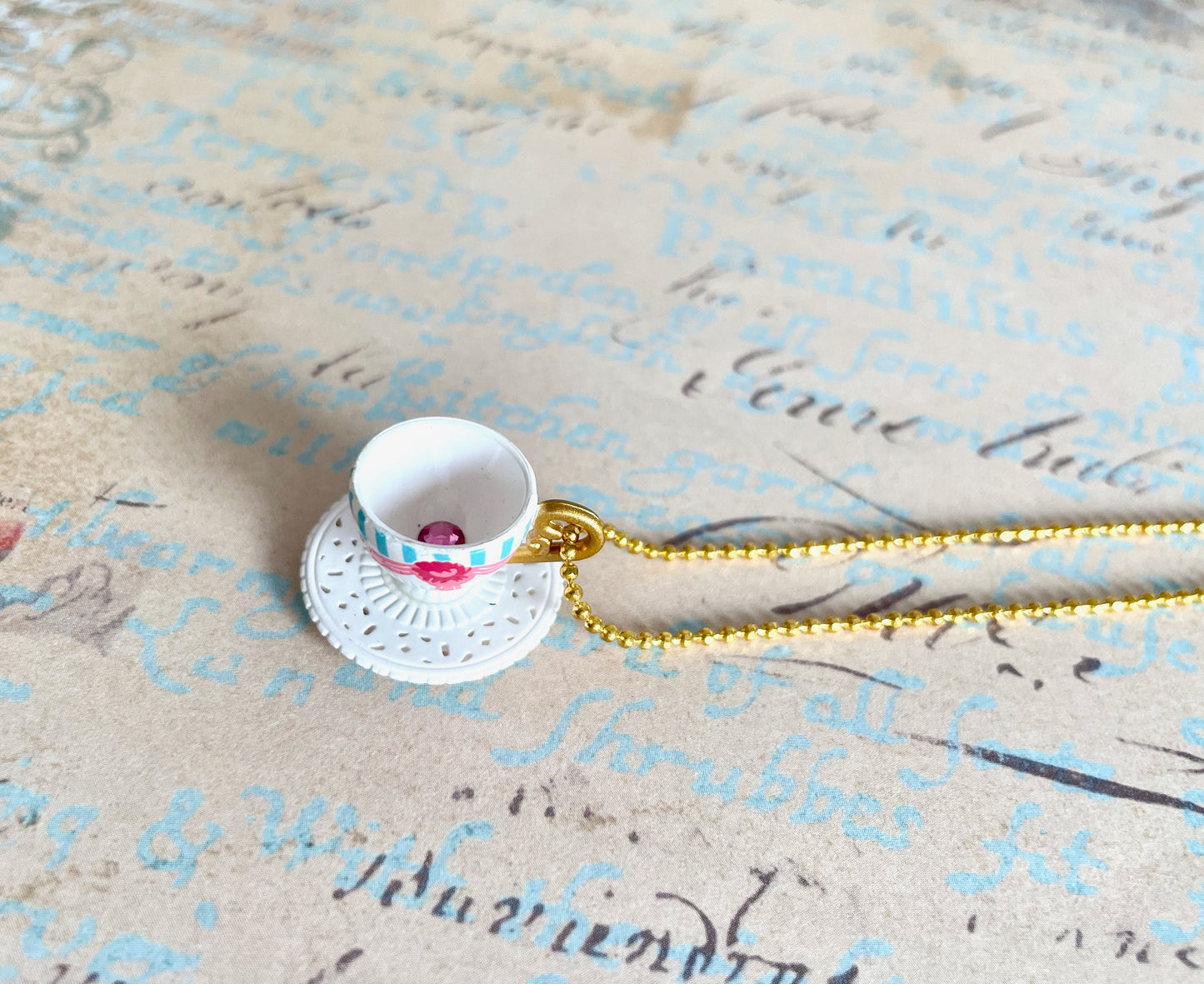 Miniature white and pink teacup necklace