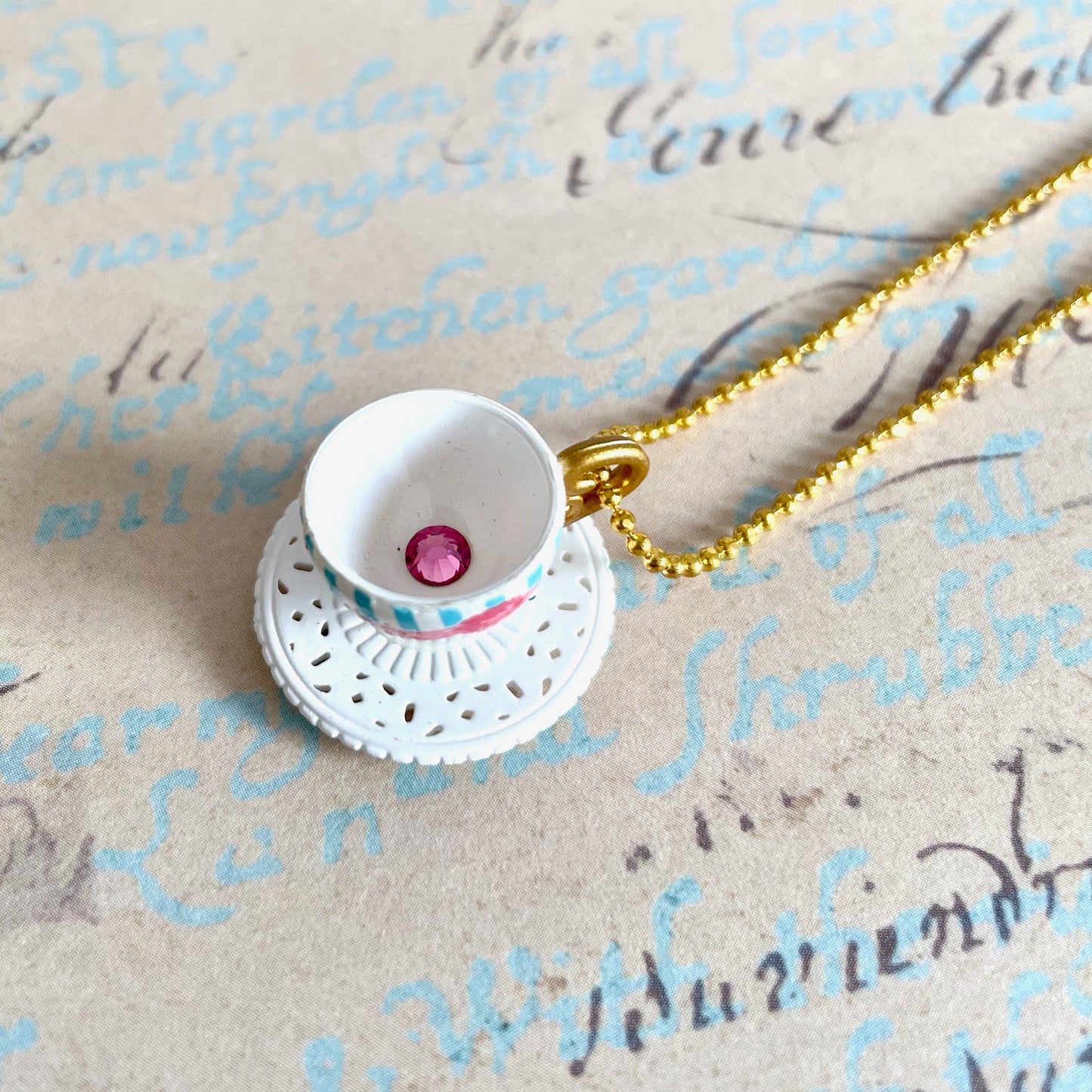 Miniature white and pink teacup necklace