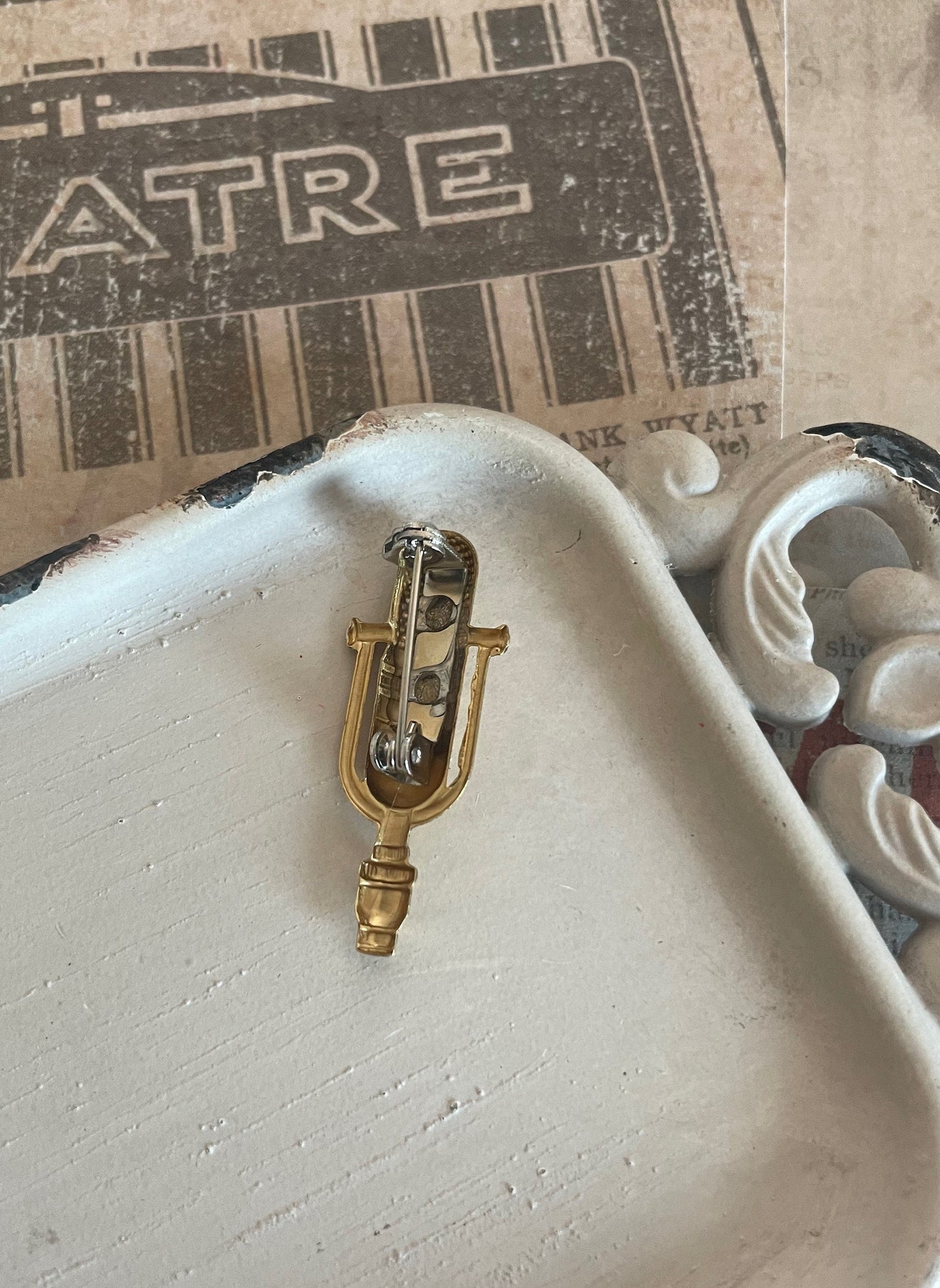 Brass microphone pin