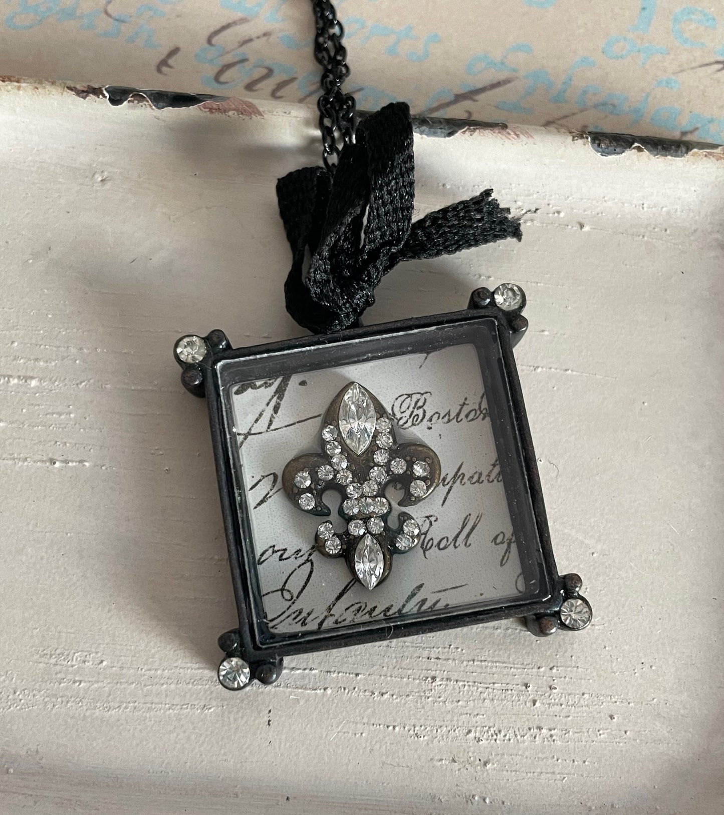 Liza - Fleur de lis shadow box necklace