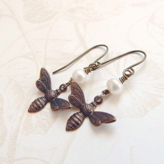 Bee charm earrings with white pearls