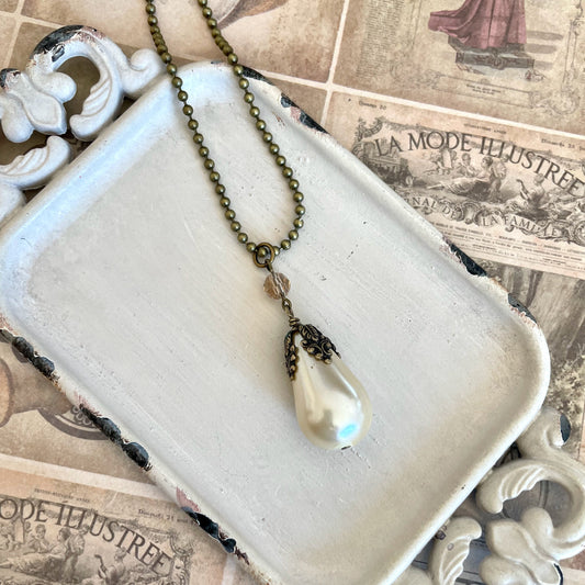 Arlena Pearl - Large teardrop pearl necklace on antique gold necklace